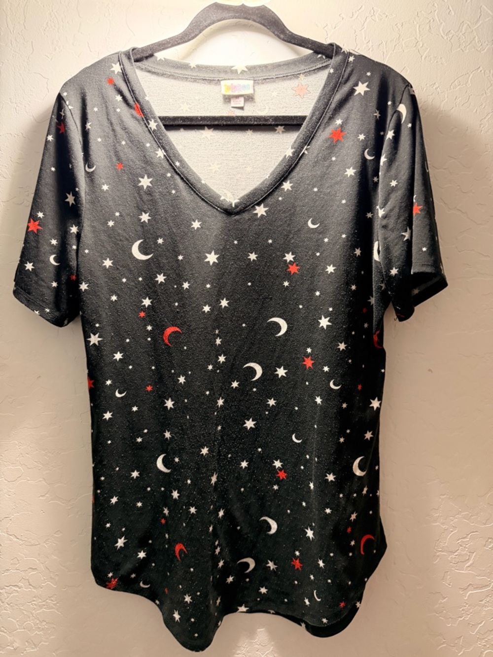 LuLaRoe Black Tee with White Moons and Red Stars
